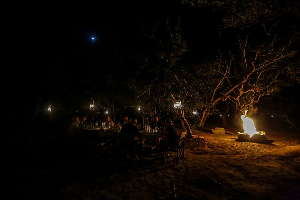 Bonfire glowing at Yala Tented Camp after dark