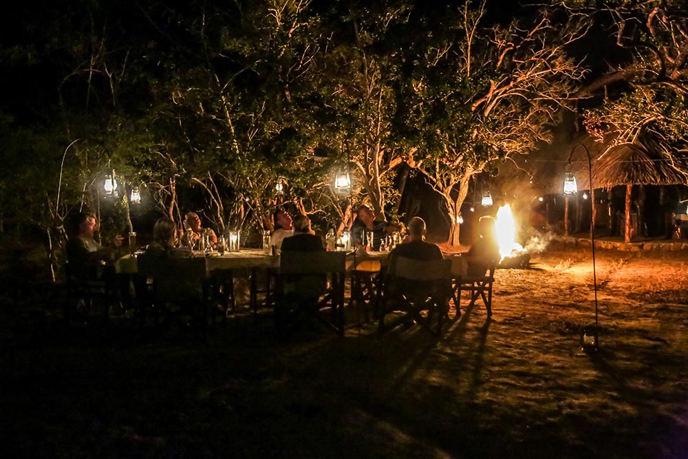Candlelit bush dinner under the trees at Yala Tented Camp