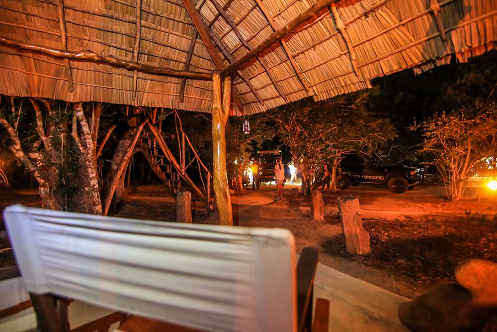 Safari jeep at the camp at night, ready for a game drive